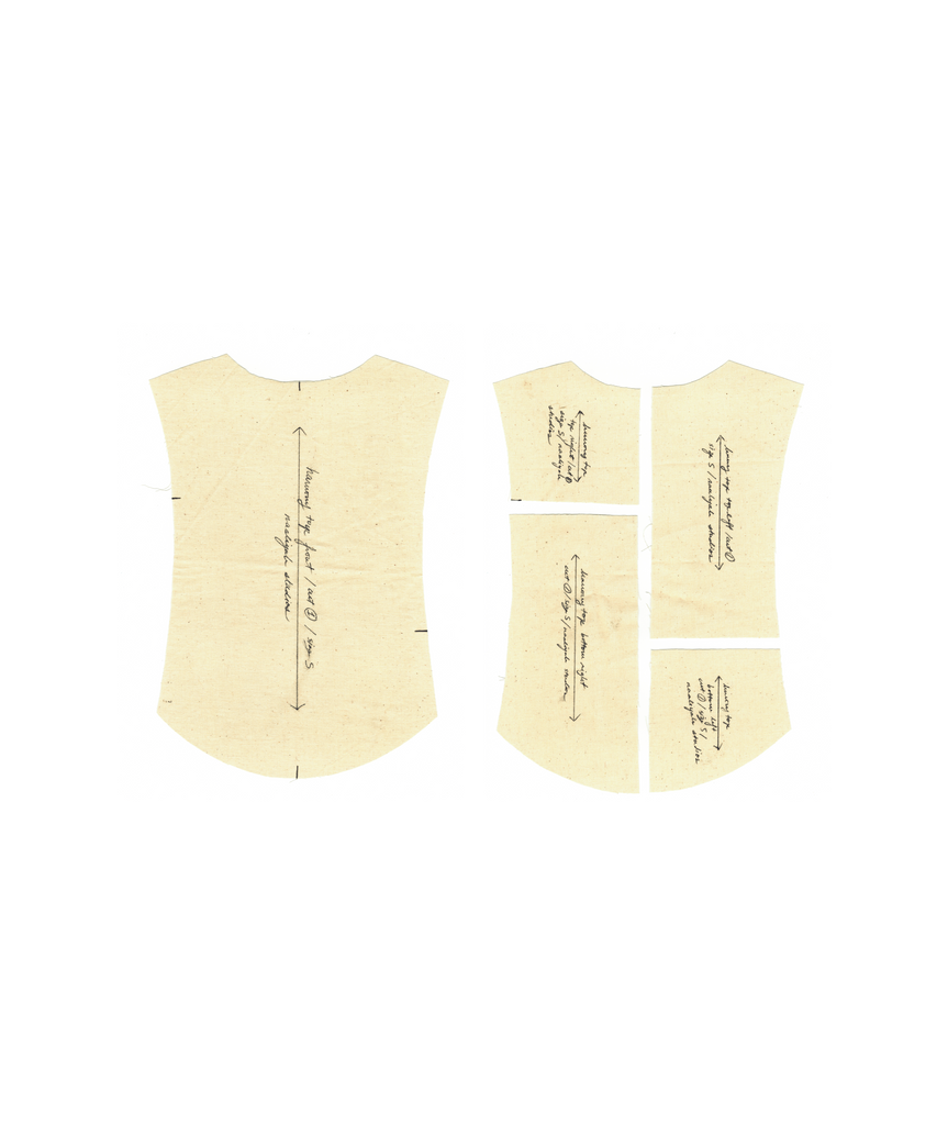 Fabric pattern templates for garment construction, featuring a full bodice piece alongside a deconstructed version, highlighting precision tailoring and textile manipulation. The handwritten notes detail seam placements and grainline directions, emphasizing craftsmanship and thoughtful design.